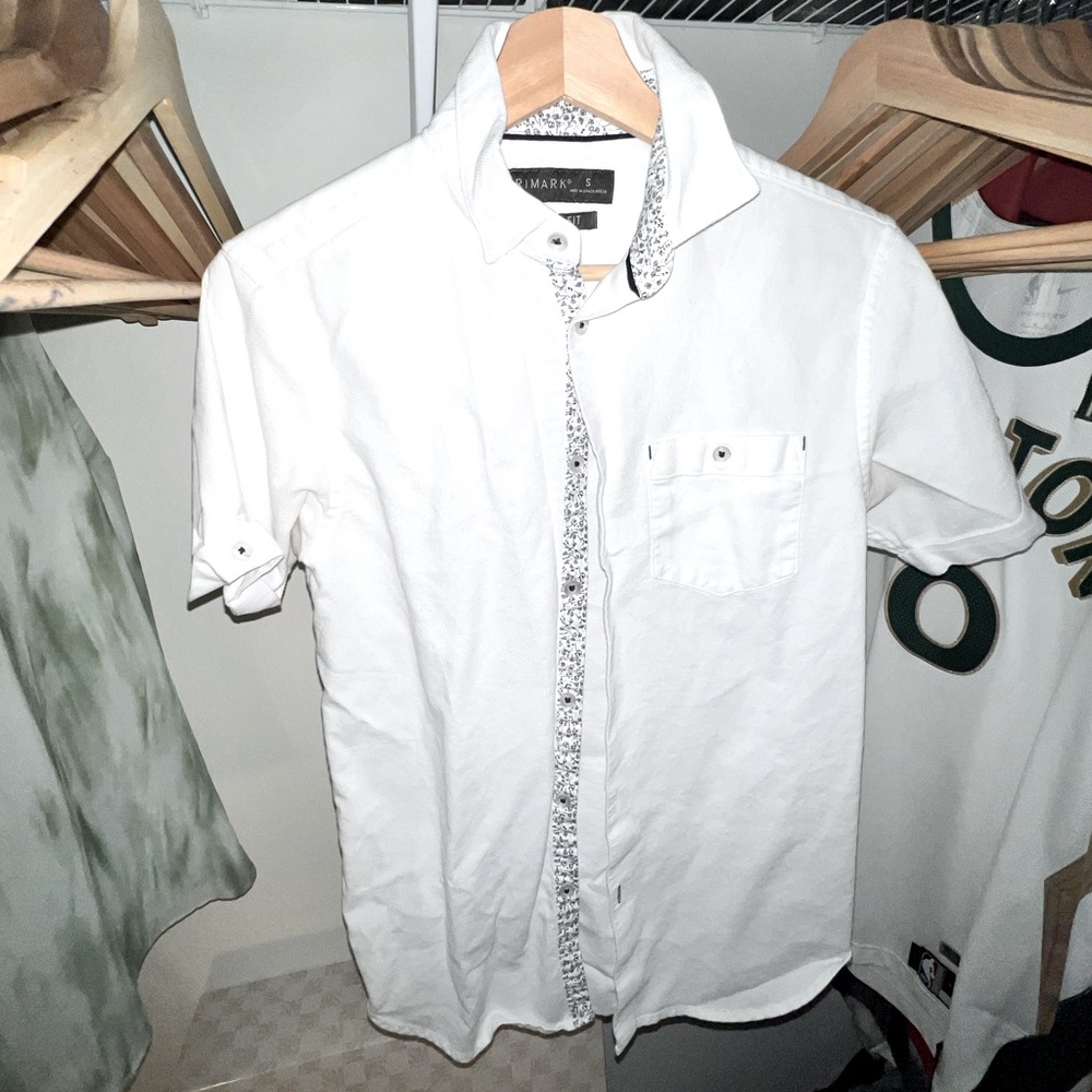 White collared button up with floral seams